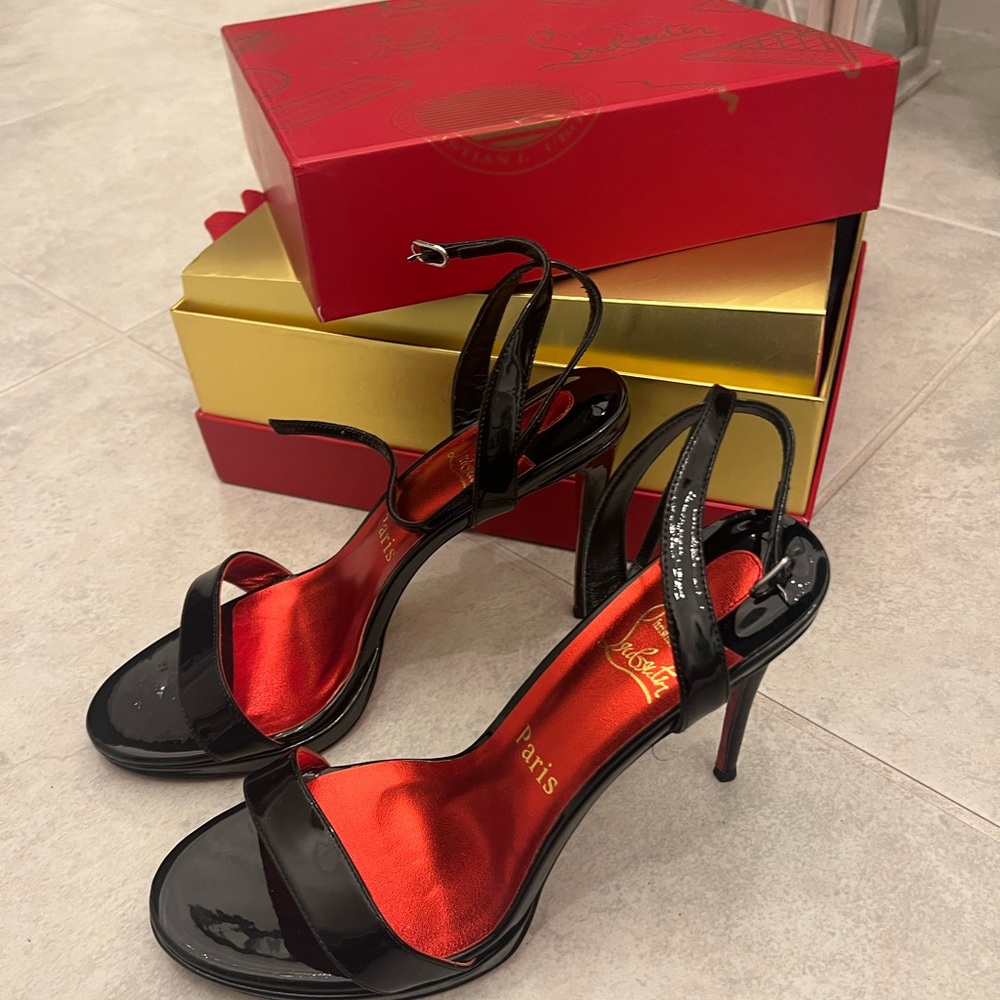 CHRISTIAN LOUBOUTIN
Loubigirl Ankle-Strap Red Sole Sandals